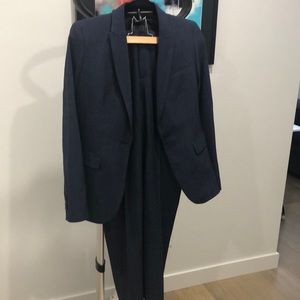 Navy blue wool suit. Fully lined. Long & lean blazer size 2. Ryan pants size 4.